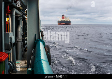 View from deck of AHTS ocean tug. Tanker vessel on background.