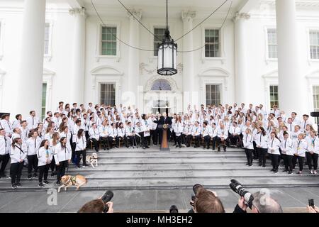U.S. President Donald Trump welcomes Olympic and Paralympic athletes during an event honoring Team USA at the White House April 27, 2018 in Washington, DC. Stock Photo