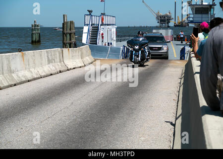 Motorcycle disembarking from Mobile Bay ferry at Fort Morgan dock. Stock Photo