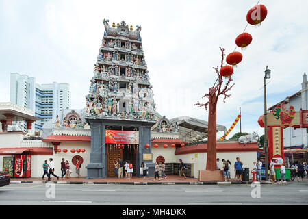 PAGODA STREET, SINGAPORE - JAN 20, 2017: Pagoda on the gate of Sri Mariamman Temple, this Hindu temple is neary the Chinese temple - Buddha Tooth Reli Stock Photo