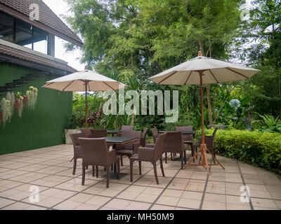 Chair made wooden in the garden with copy space. Stock Photo