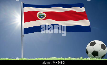 Flag of Costa Rica fluttering and a football rolls on the lawn, 3d rendering Stock Photo