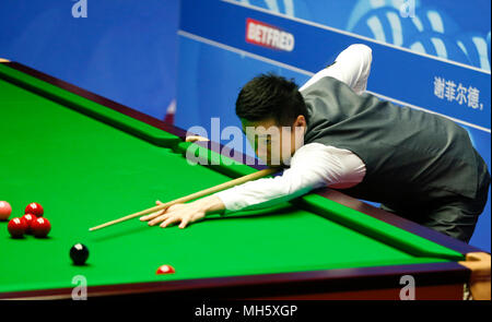 Sheffield, UK . 30th Apr, 2018. Ding Junhui of China competes during the second round match with Anthony McGill of Scotland at the World Snooker Championship 2018 at the Crucible Theatre in Sheffield, UK , Britain on April 30, 2018. Ding Junhui won 13-4. Credit: Han Yan/Xinhua/Alamy Live News Stock Photo