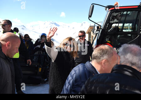 30 April 2018, Austria, Ischgl: The singer Helene Fischer goes to a snowmobile before the so far biggest Top of the Mountain Closing concert at the Austrian skiing metropolis Ischgl. Never before have there been as many guests at the Idalp, in the centre of the skiing region, and celebrated with Europea's most successful singer a sunny season finale. Photo: Felix Hörhager/dpa Stock Photo