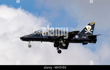 RNAS Culdrose, UK. 30th April, 2018. Perfect flying weather for the aircrew of this Royal Navy Hawk T1 jet. The jet is assigned to 736 Naval Air Squadron at RNAS Culdrose and seen here returning from a flight back to base Credit: Bob Sharples/Alamy Live News Stock Photo