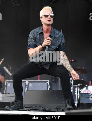 SUNRISE FL - APRIL 29: Jeff Gutt of Stone Temple Pilots performs during Fort Rock at Markham Park on April 29, 2018 in Sunrise, Florida. Credit: mpi04/MediaPunch Stock Photo