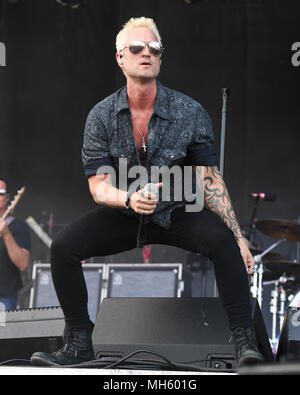 SUNRISE FL - APRIL 29: Jeff Gutt of Stone Temple Pilots performs during Fort Rock at Markham Park on April 29, 2018 in Sunrise, Florida. Credit: mpi04/MediaPunch Stock Photo