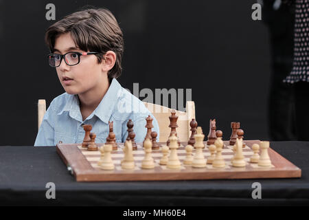 World champion Anatoly Karpov during simultaneous exhibition against young  chess players Stock Photo - Alamy