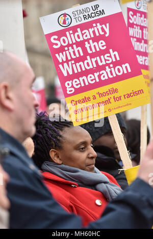Parliament Square, London, UK. 30th April 2018. 'Justice For Windrush - Scrap May's Racist Act.' Protesters  in Parliament Square during the emergency debate on the Windrush petition. Credit: Matthew Chattle/Alamy Live News