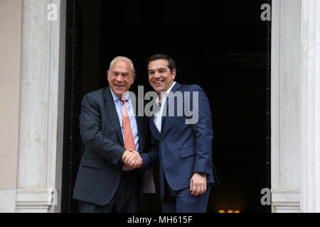 (180430) -- ATHENS, April 30, 2018 (Xinhua) -- Greek Prime Minister Alexis Tsipras (R) welcomes Secretary-General of the Organization for Economic Cooperation and Development (OECD) Angel Gurria at the Prime Minister office in Athens, Greece, on April 30, 2018. The time has come for further Greek debt relief, Angel Gurria said here on Monday after meeting with Alexis Tsipras. (Xinhua/Marios Lolos) Stock Photo