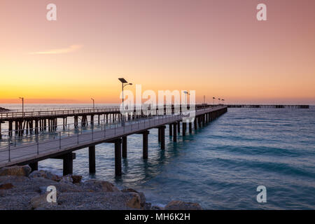 Sunset over the new and old Jetties at Rapid Bay South Australia on 13th May 2010 Stock Photo