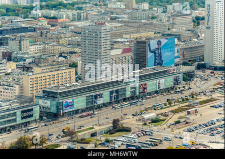 Warsaw / Poland - 09.15.2015: Aerial view on the main street in downtown with commercial buildings located by. Stock Photo