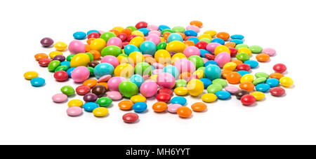 Colorful chocolate candy pills isolated on white background. Stock Photo