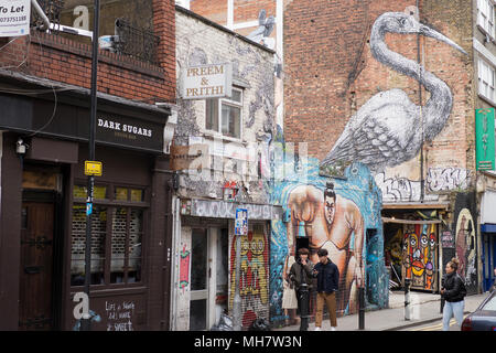 Side street off Brick Lane in Whitechapel East London Stock Photo