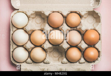 Natural colored eggs for Easter in box, horizontal composition Stock Photo