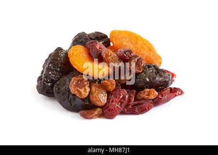 Mix of dried fruits (prunes, raisins, apricots and cranberries) isolated on white background Stock Photo