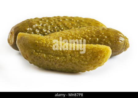 Pickled cucumbers, also known as gherkins or cornichons, isolated on white background Stock Photo