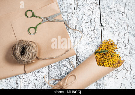 Bouquet of mimosa flowers on wooden background. Stock Photo