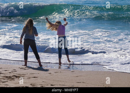 Holidaymakers enjoying themselves on Fistral Beach in ...