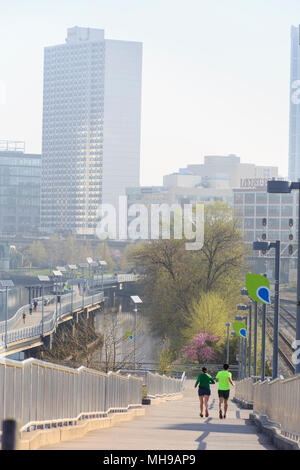 Philadelphia Skyline Aerial with Schuylkill River Park Boardwalk in springtime with Joggers and cyclist, Philadelphia , Pennsylvania, USA Stock Photo