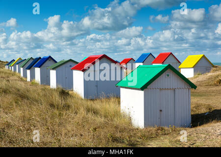 Surreal Beach Huts at Gouville-sur-Mer, Manche, Normandy with a very nice blue sky Stock Photo