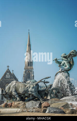 Bronze fountain completed in 1908, depicting Norse goddess Gefion plowing the sea with 4 oxen. Stock Photo