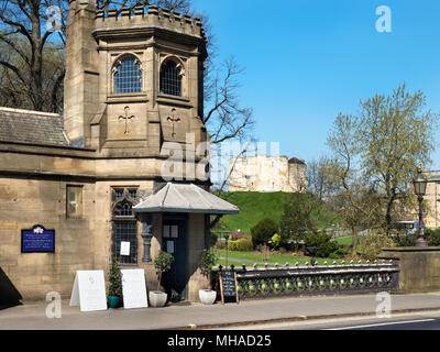 Old toll house on Skeldergate Bridge with Cliffords Tower beyond York Yorkshire England Stock Photo