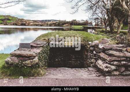 April 30th, 2018, Gougane Barra, Ireland - Holy well of Saint Finbarr's Oratory, a chapel built on an island in Gougane Barra, a very serene and beaut Stock Photo