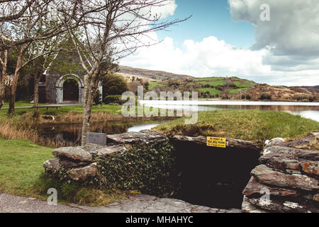 April 30th, 2018, Gougane Barra, Ireland - Holy well of Saint Finbarr's Oratory, a chapel built on an island in Gougane Barra, a very serene and beaut Stock Photo