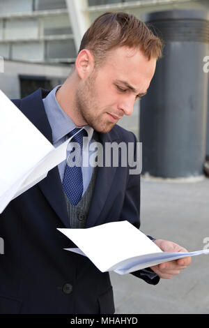 businessman emotionally reading documents Stock Photo