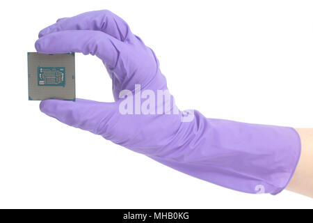 Hand wearing gloves holding a CPU computer processor microchip isolated on white background Stock Photo