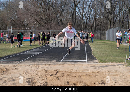 Middle school youth participate in a track and field meet at Middleton High School, Middleton, WIsconsin, USA. Stock Photo