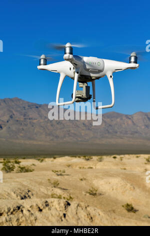 Operating a Drone over the Nevada Desert Stock Photo