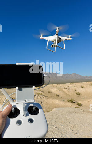 Operating a Drone over the Nevada Desert Stock Photo