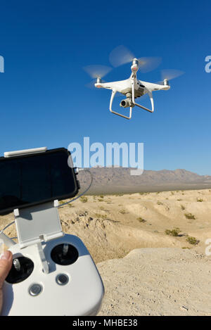 Operating a Drone over the Nevada Desert Stock Photo