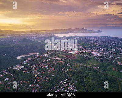 Cityscape of Managua town aerial view in sunset time. Managua landscape capital of Nicaragua Stock Photo