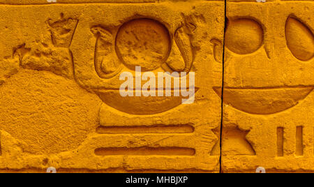 Well preserved authentic real Egyptian hieroglyphs on the wall in a temple Stock Photo