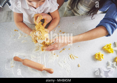 Mom and daughter make homemade cookies. Stock Photo