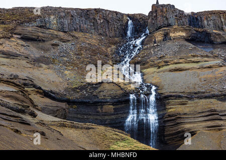 Small side waterfall next to Hengifoss in Eastern Iceland Stock Photo