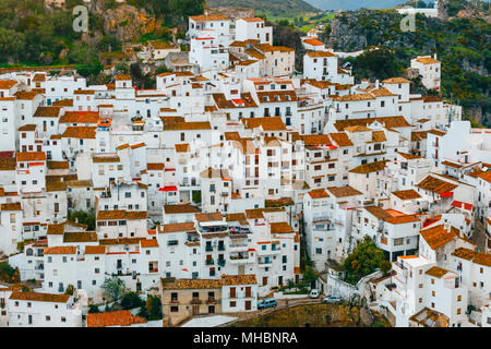 White Andalusian village - pueblo blanco - in the mountain range in Casares during sunset Stock Photo