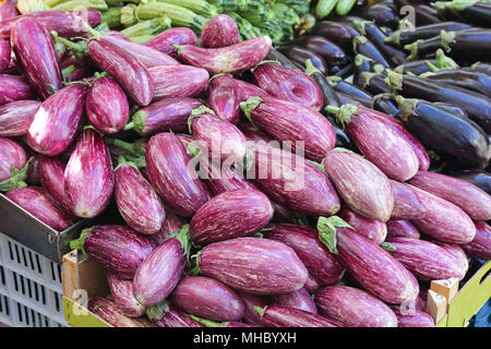 Bunch of Aubergines at Farmers Market Stock Photo