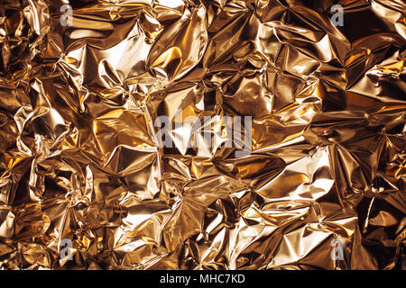 https://l450v.alamy.com/450v/mhc7kd/full-frame-take-of-a-sheet-of-crumpled-silver-aluminum-foil-background-mhc7kd.jpg