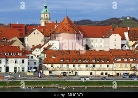 Old Vine House building in Maribor city, Slovenia. Facade of the building is covered with 400 years old Vine. It is the oldest vine in the world, regi Stock Photo