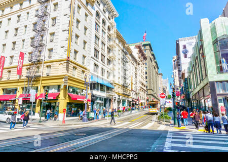 SAN FRANCISCO - APR 2, 2018: A crowded street on Powell in heart of downtown San Francisco where shops and restaurants abound. Stock Photo