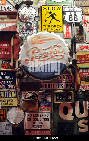 A display of vintage advertising and road signs outside the 66 Diner on Route 66 in Albuquerque, New Mexico. Stock Photo