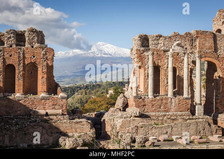 Ancient theatre of Taormina with Mt. Etna, Sicily. Stock Photo