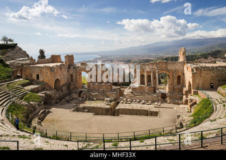 Ancient theatre of Taormina with Mt. Etna, Sicily. Stock Photo