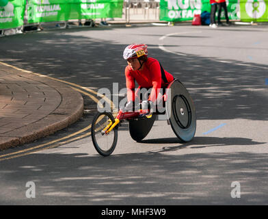 Zou Lihong, competing for China, in the in the 2018 London Marathon Elite Women's Wheelchair race. She finished 13th in a time of 01:58:00 Stock Photo