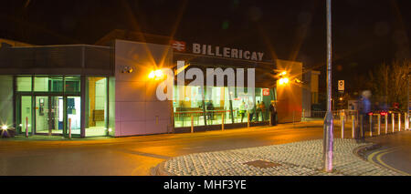 Billericay, Essex Railway Station at Night (late Evening). lights reflecting on wet road Stock Photo