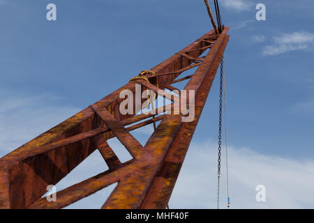 Old rusty Crane rig near Portland Bill, looking skyward Stock Photo